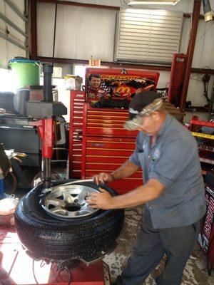 Here's Glenn taking the tire off the rim.