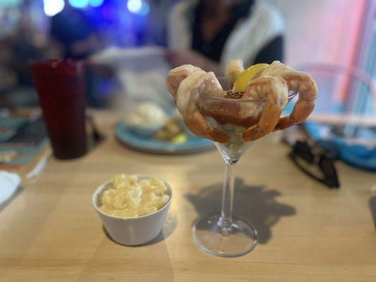 Shrimp cocktail and a side of macaroni