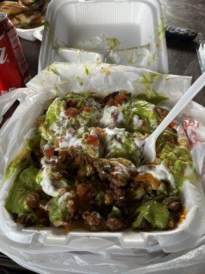 "CARNE ASADA PAPAS" PERO SIN PAPAS, PURO FRIJOLE Y GUACAMOLE‍