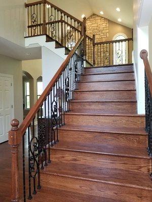 Brazilian cherry steps refinished with spindles installed