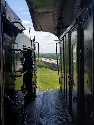 A view of the interstate in between Big Boys train cars.