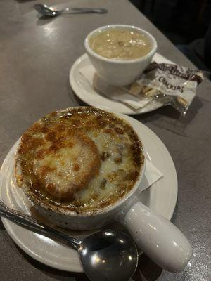 Cup of New England clam chowder and croc of French onion soup