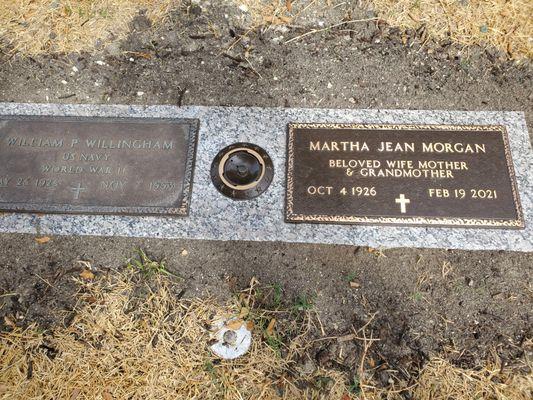 Granite slab covering mom's grave and Mr. Willingham's grave.