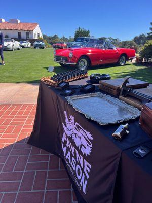 Rolling handmade cigars at the 74th Annual Pebble Beach Concours D'Elegance August 2023