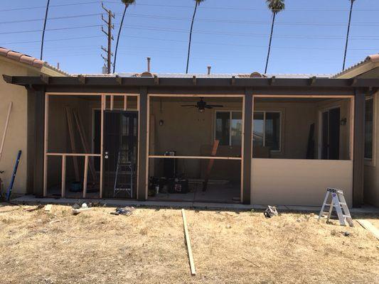 Enclosed patio halfway done