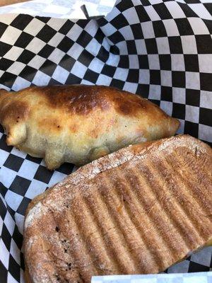 Beef empanada and ham and cheese panini