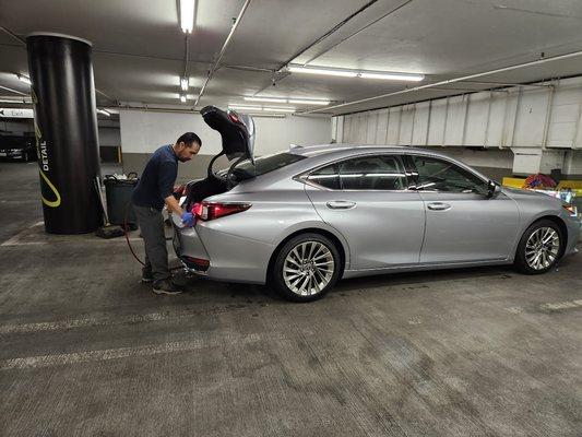 Arturo blew dry and also hand dried the vehicle including the trunk where water typically seeps in.