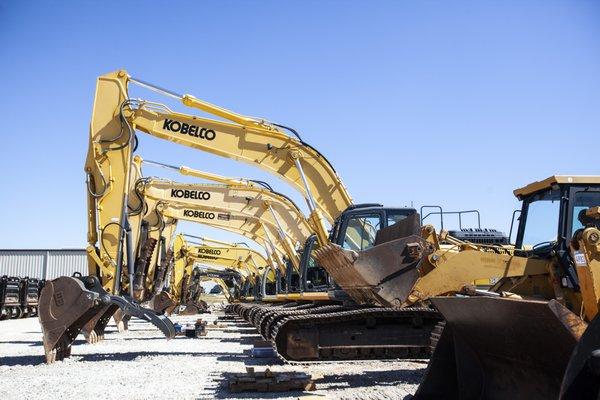 Lineup of excavators at our auction in Huntsville, AL in October 2022