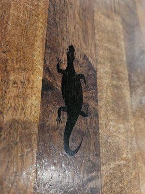 Gecko on the bar