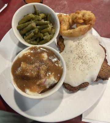 Tuesday Special; chicken fried steak, milk gravy, mash potatoes and green beans.