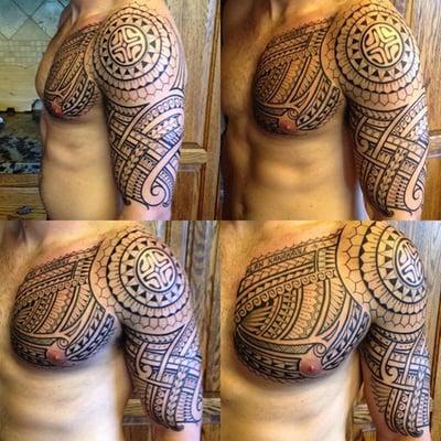 Polynesian Chest to half sleeve tattoo.