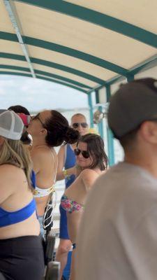 Other guests dancing on the boat having a good time