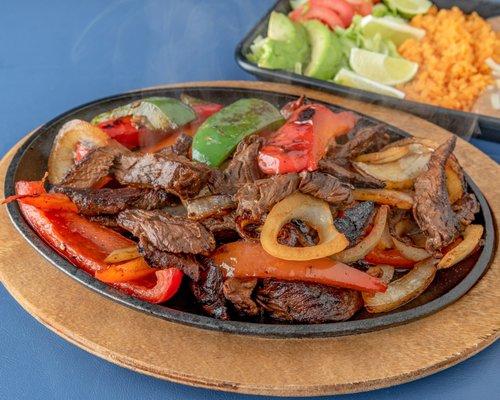 Fajita Dinner - Choose from Steak, Chicken, Shrimp or a Combo! Comes w/ Rice, Beans & Tortillas!