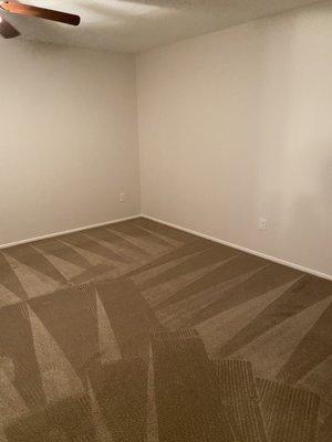 Master bedroom, most of the impressions in the carpet from previous furniture is lifted