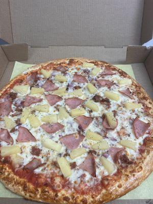 Hawain pizza with ham and pineapple.