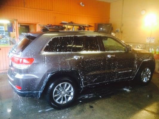 Getting a hand wash and engine steam.