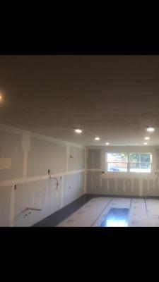 Drywall hung, tape and bed complete