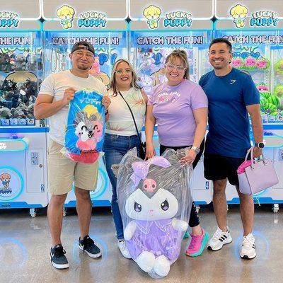 Family fun winners at Lucky Puppy Claw Machine Arcade!