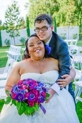 Me and my sweetheart on our wedding day. Bloomies on Main did such a great job on my bouquet.