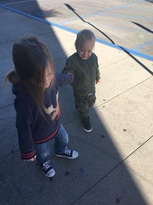 Frankie and Spencer walk to the library for story time, after the judge released us from visitation monitoring. Both looking "bedhead-chic!"