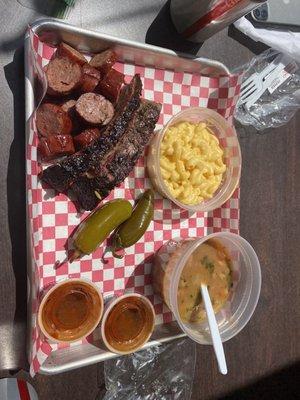 Moist brisket, sausage, Mac n cheese, frijoles, jalapeños