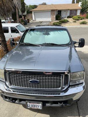 Newly painted truck, hood view.