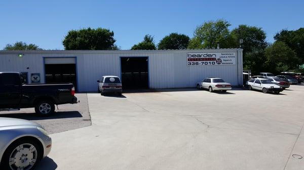 Here's our shop with newly paved parking lot and the infamous shop van that has over 460,000 miles on it.