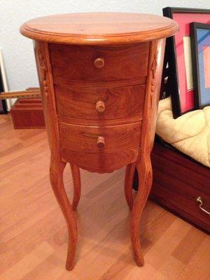 Our cute little teak table...looking for a home in my house