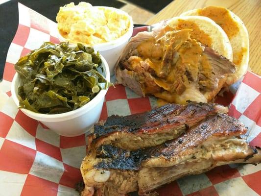 Two meat platter - ribs and brisket with greens and potato salad