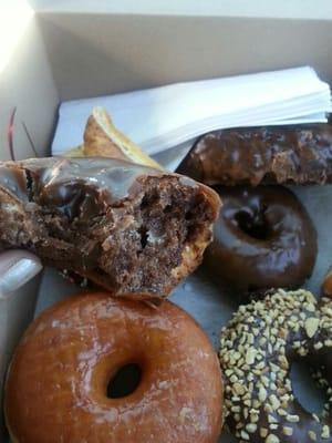 Inside of a chocolate chocolate glazed cake donut. Mmmm. It was soft and yummy.