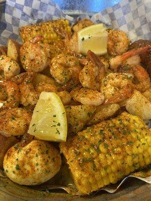 Shrimp, potatoes, corn and eggs