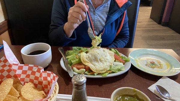 Salad with 2 eggs.