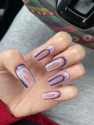 Acrylic full sets/fills and design done by Henry