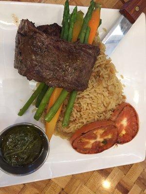 Churrasco: Cuban steak, chimichurri, grilled tomatoes, steamed carrots and asparagus, rice. $17