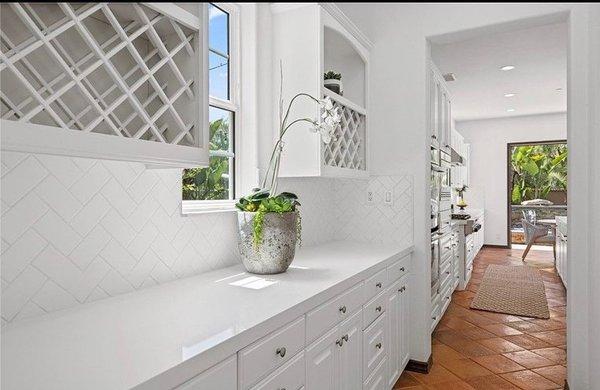 Herringbone backsplash with Quartz countertops