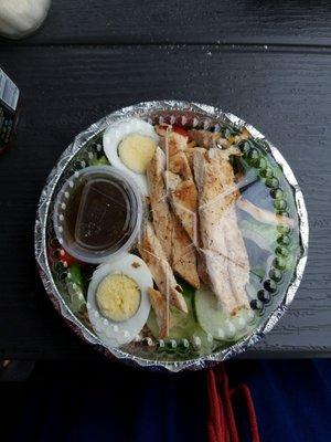 Ate my pizza slice before taking a picture...oops, it was that good! Here's my Cobb salad for later. Delicious food! Affordable!