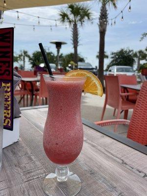 Frozen strawberry daiquiri outside on the patio.