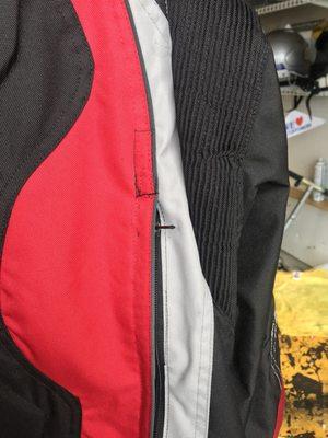 Misaligned zipper and "fixed" the black thread to red.