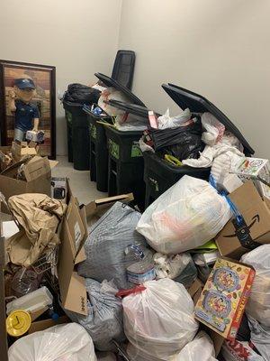 The trash room overflowing