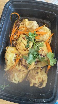 Spicy dumplings -  love the sauce - not that spicy but nigh tingle your tongue