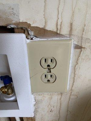 Wall damage and outlet plate damage.