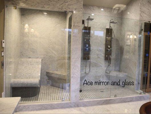 Frameless shower enclosure with starphire glass