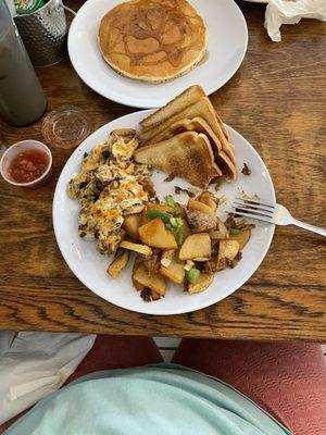 Scrambler with mushrooms, onions, and bacon; crazy delicious home fries; white toast (and hubby's pancake)