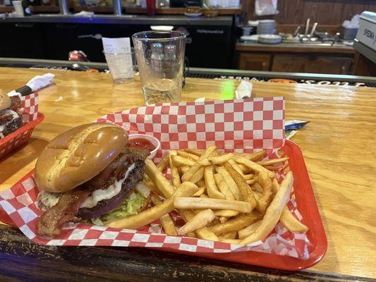 The Creek Burger with bacon and fries.