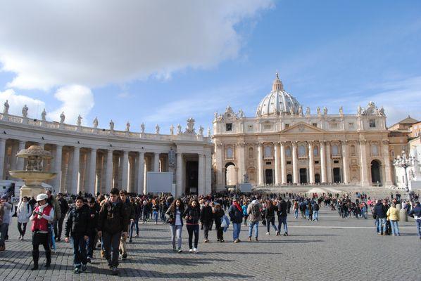 Pilgrims in St. Peter's Square, outside the Basilica of St. Peter in Vatican City.