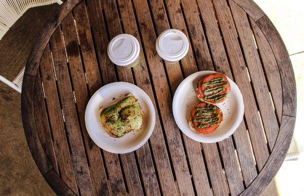 Avocado toast and special bagel (toasted bagel with hummus, Mac nut pesto and tomatoes)