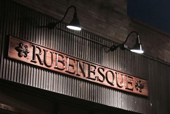 Our Storefront sign at night