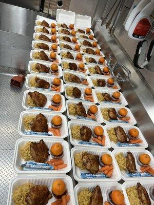 75 meals for Rogue Food Unites.  We can do individually boxed lunches for your party, too!