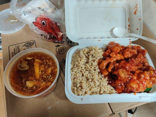 Hot & sour soup (left), General Tso Chicken with brown rice (right)