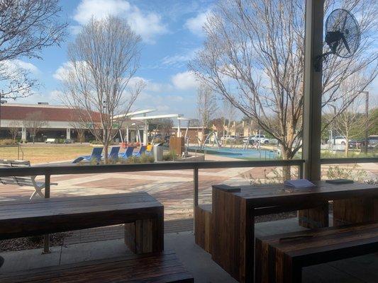 Outdoor playground area where you can send the kids and still keep an eye on them while you eat or enjoy a beer.